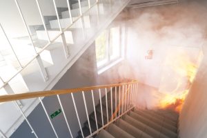 Are there rules for fire safety in assembly occupancies, such as theatres or auditoriums?